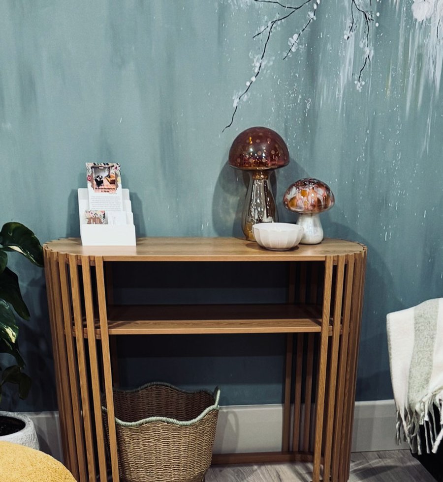 Handmade mushroom lamps and warm timber in the studio